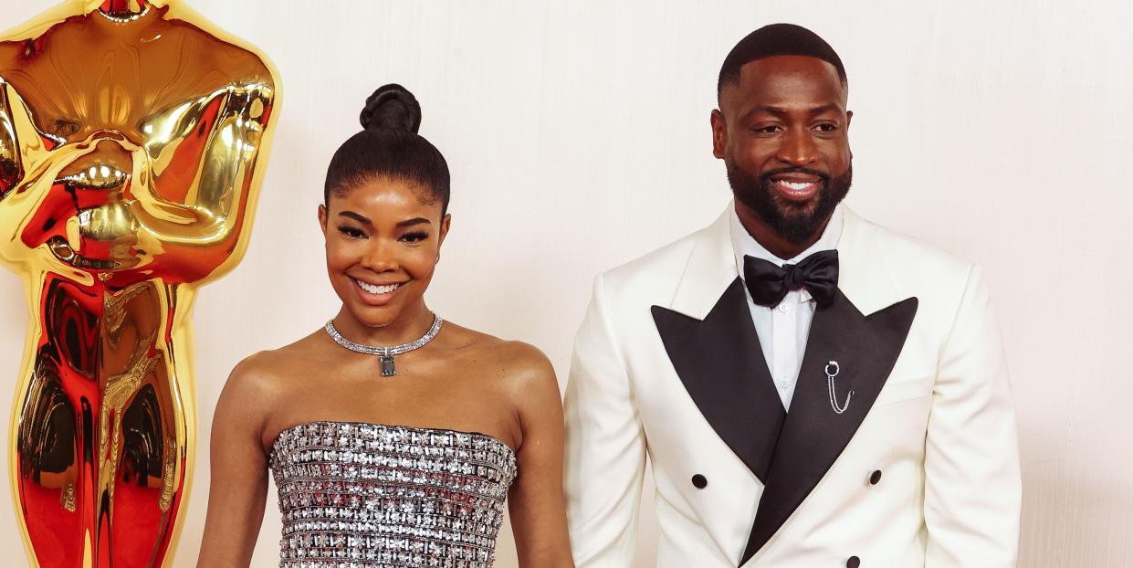 gabrielle union and dwayne wade at the 96th annual oscars held at ovation hollywood on march 10, 2024 in los angeles, california photo by lexie morelandwwd via getty images