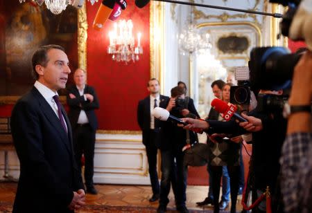 Austrian Chancellor Christian Kern talks to journalists in the presidential office in Vienna, Austria October 18, 2017. REUTERS/Leonhard Foeger