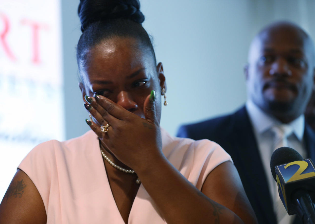 Image: Tomika Miller, the widow of Rayshard Brooks, wipes away tears as she participates in a press conference at her lawyers office after Fulton County District Attorney Paul L. Howard, Jr. announced 11 charges against former Atlanta Police Officer Garre (Joe Raedle / Getty Images)