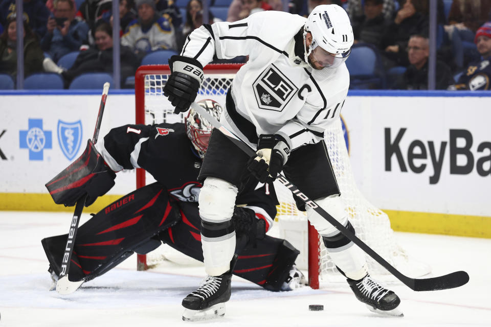 Los Angeles Kings center Anze Kopitar (11) is stopped by Buffalo Sabres goaltender Ukko-Pekka Luukkonen (1) during the second period of an NHL hockey game Tuesday, Feb. 13, 2024, in Buffalo, N.Y. (AP Photo/Jeffrey T. Barnes)