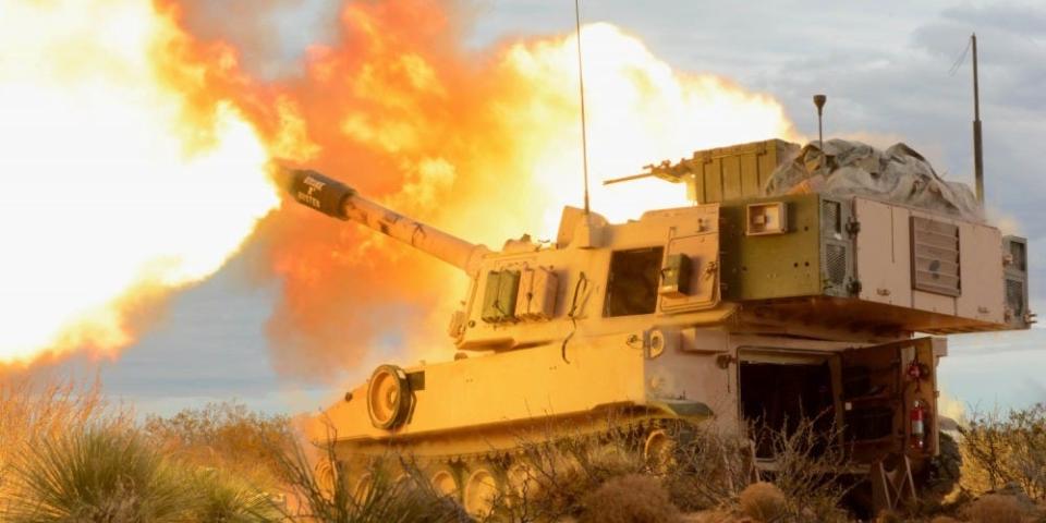 An M109 Paladin gun crew with B Battery, 4th Battalion, 1st Field Artillery Regiment, Division Artillery at Fort Bliss, Texas fires into the mountains of Oro Grande Range Complex, New Mexico Feb. 14, 2018.