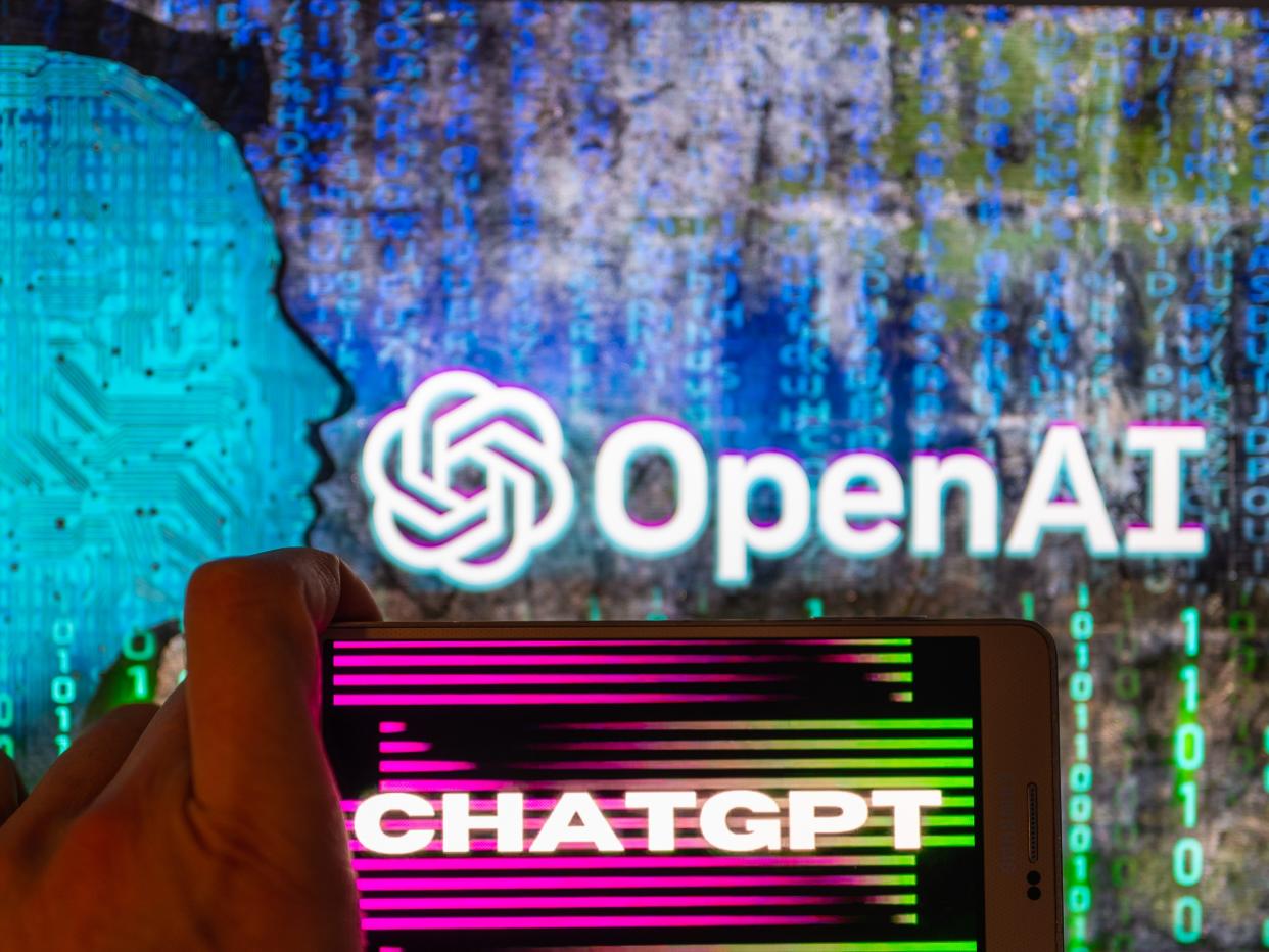 An image of a phone with ChatGPT and OpenAI's logo visible.