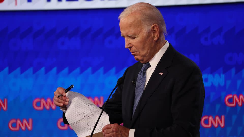 President Joe Biden flips through his notes during the debate in Atlanta. - Austin Steele/CNN