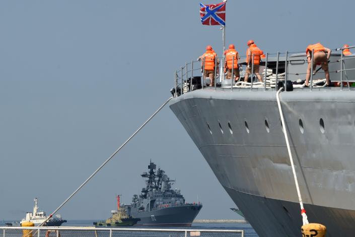 File: Sailors aboard the Russian anti-submarine ship Admiral Tributs stand on 8 April 2019 (AFP via Getty Images)