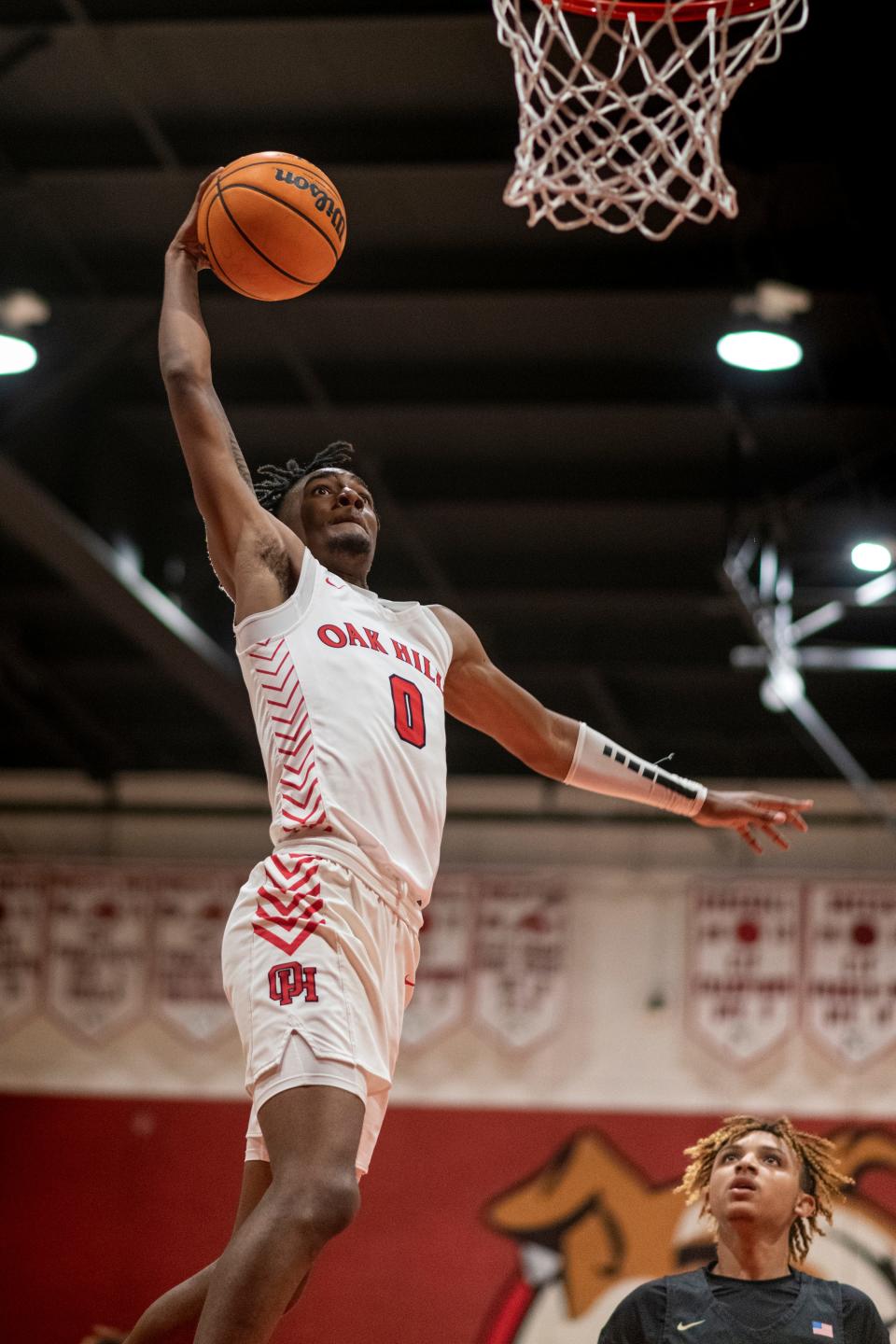 Oak Hills' Michael Miller dunks against Hesperia on Friday, Jan. 21, 2022. The Bulldogs won 69-57.