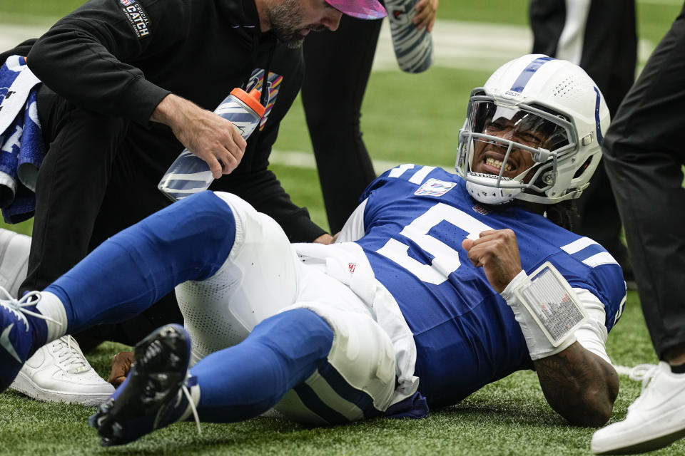 Indianapolis Colts quarterback Anthony Richardson (5) lies on the field after being injured during the first half of an NFL football game against the Tennessee Titans, Sunday, Oct. 8, 2023, in Indianapolis. (AP Photo/Darron Cummings)