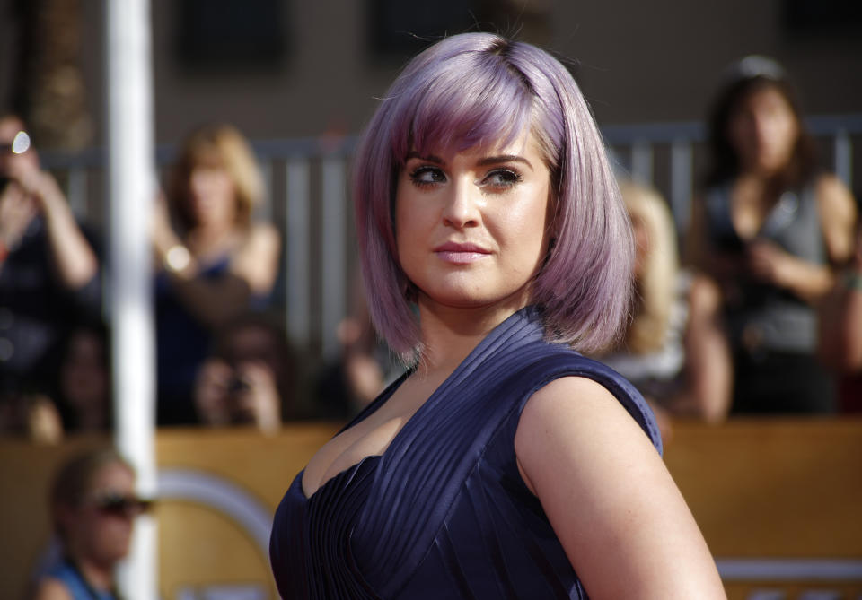 TV personality Kelly Osbourne arrives at the 20th annual Screen Actors Guild Awards in Los Angeles, California January 18, 2014. REUTERS/Lucy Nicholson (UNITED STATES Tags: ENTERTAINMENT)(SAGAWARDS-ARRIVALS)