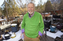 Howard Jones, an 83-year-old veteran, talks about his struggle to secure a COVID-19 vaccination in El Paso County while seated on the deck outside his home Tuesday, Jan. 12, 2021, in southwest Colorado Springs, Colo. Not having internet in his home, Jones ended up getting help from a friend to get an appointment for the vaccine in Colorado Springs. (AP Photo/David Zalubowski)