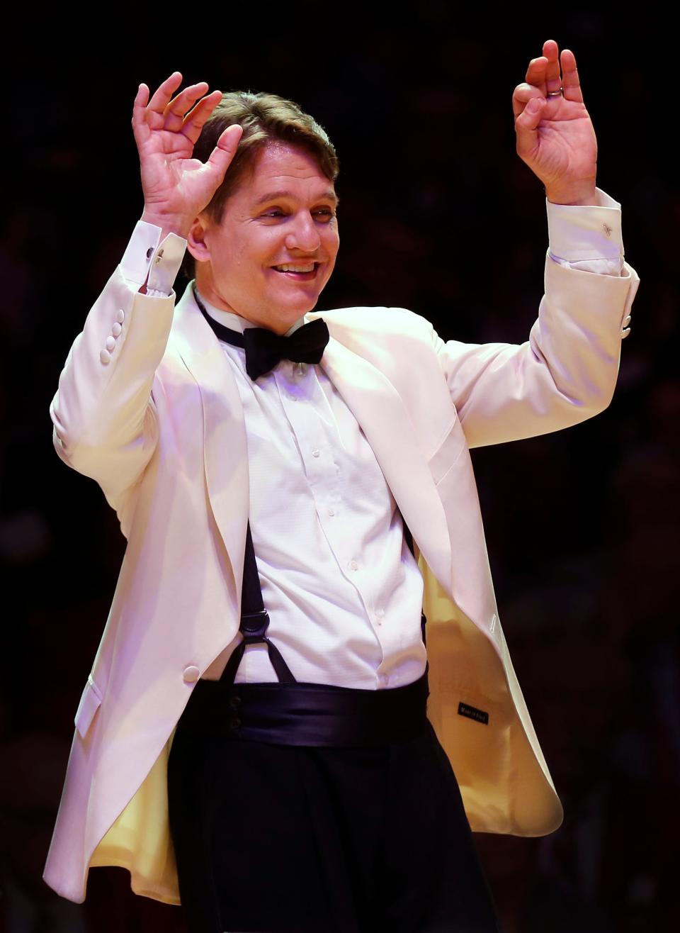 Conductor Keith Lockhart performs with 15-year-old prodigy Amaryn Olmeda and the Des Moines Symphony on Sunday.