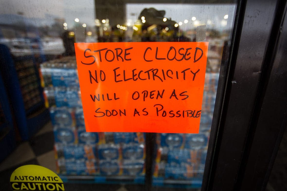 A sign states that a Fiesta Mart is closed because of a power outage in Austin, Texas on February 17, 2021. (Photo by Montinique Monroe/Getty Images)