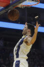 Indiana Pacers forward Doug McDermott reacts after dunking against the Golden State Warriors during the first half of an NBA basketball game in San Francisco, Friday, Jan. 24, 2020. (AP Photo/Jeff Chiu)