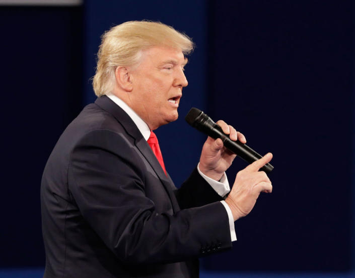 <p>Republican presidential nominee Donald Trump speaks during the second presidential debate with Democratic presidential nominee Hillary Clinton at Washington University in St. Louis, Sunday, Oct. 9, 2016. (Photo: John Locher/AP) </p>