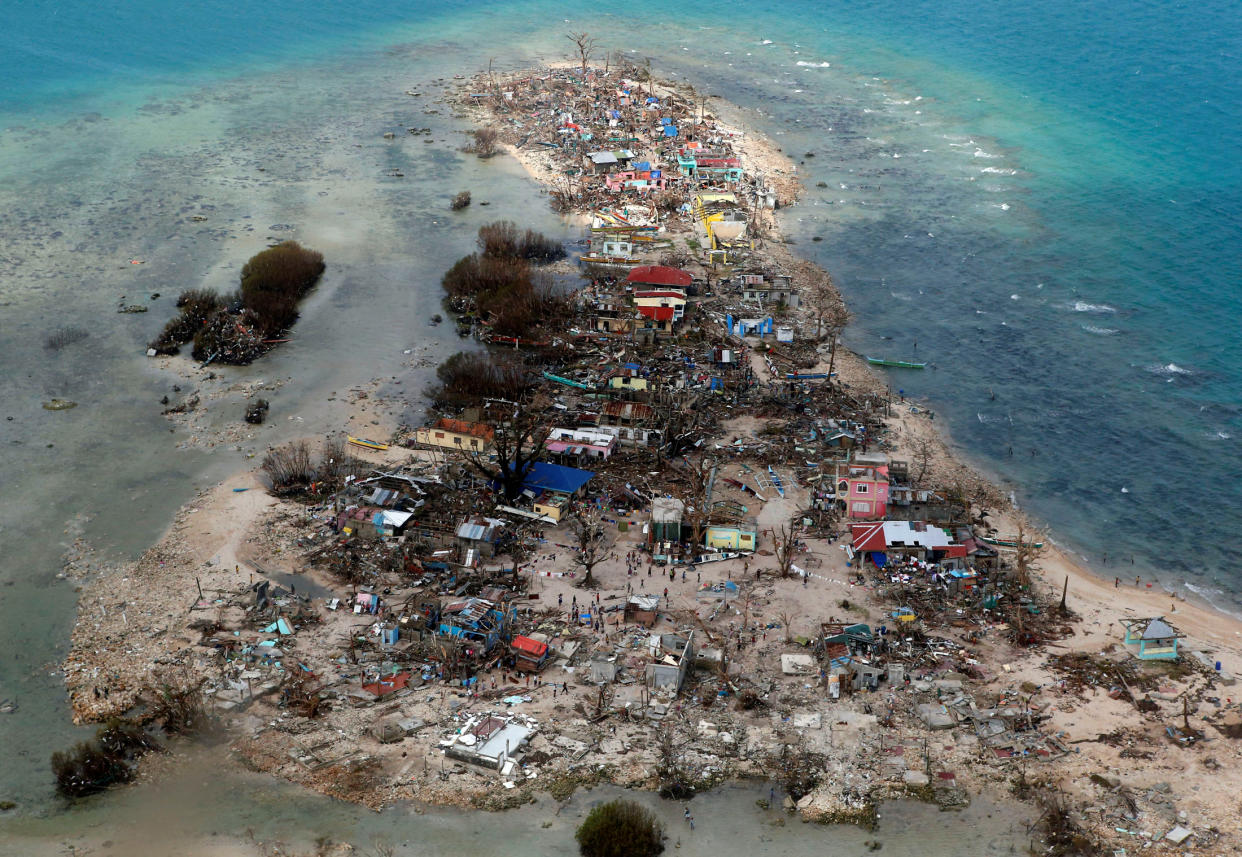 File Photo: An aerial view of a coastal town devastated by super Typhoon Haiyan in Samar province, Philippines, November 11, 2013. REUTERS/Erik De Castro