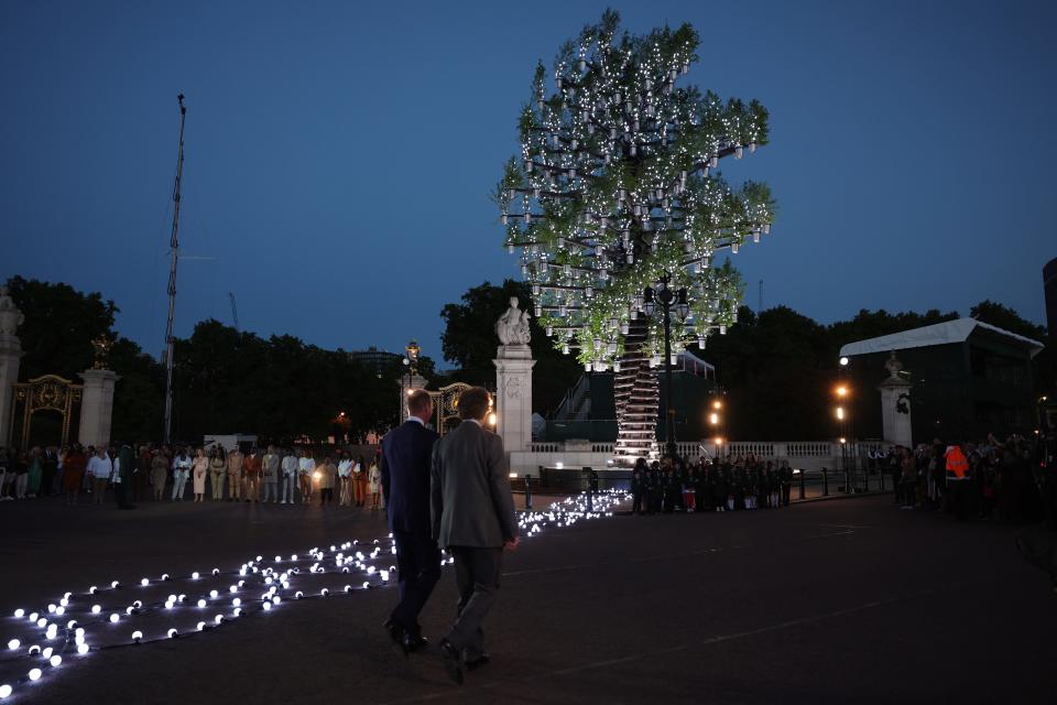 Prince William, Duke of Cambridge, and Sir Nicholas Bacon attend The Lighting Of The Principal Beacon at Buckingham Palace on June 2, 2022, in London.