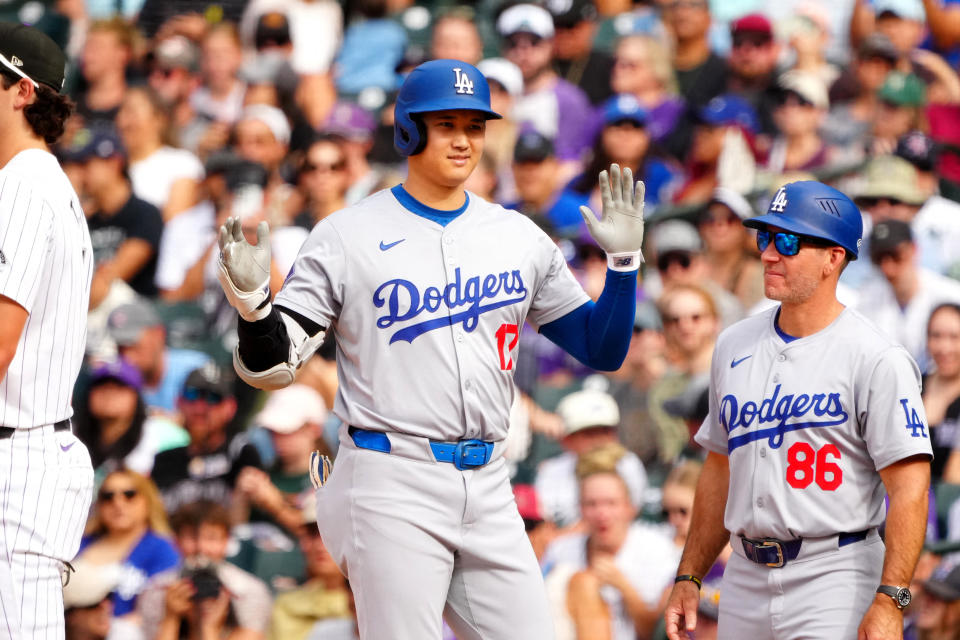 September 29, 2024; Denver, Colorado, USA; Los Angeles Dodgers designated hitter Shohei Ohtani (17) celebrates his single in the eighth inning against the Colorado Rockies at Coors Field. Mandatory attribution: Ron Chenoy-Imagn Images