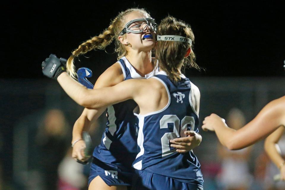 Moses Brown's Kat Gauvin and Ashley Brousseau celebrate a goal during a game earlier this month. On Tuesday, they helped the Quakers blank La Salle.