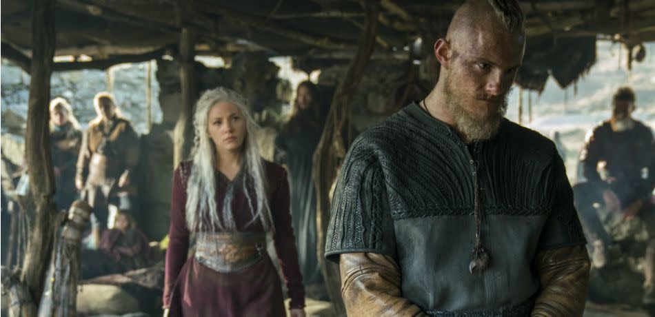 Lagertha and Bjorn stand inside a structure