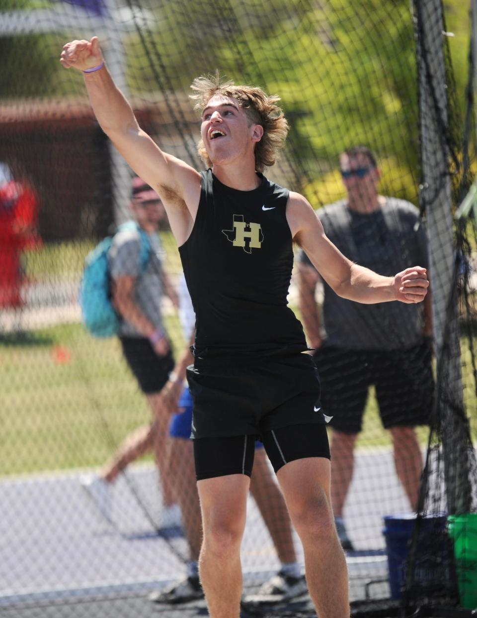 Henrietta's Klein Essler throws in the discus at the Region I-3A track and field meet at Abilene Christian University on Saturday, April 30, 2022.