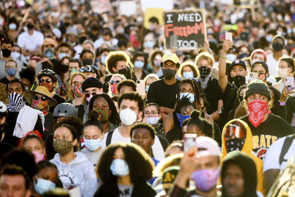 Several thousand demonstrators gather in Oakland, Calif., on Monday, June 1, 2020, to protest the death of George Floyd, who died after being restrained by Minneapolis police officers on May 25. (AP Photo/Noah Berger)