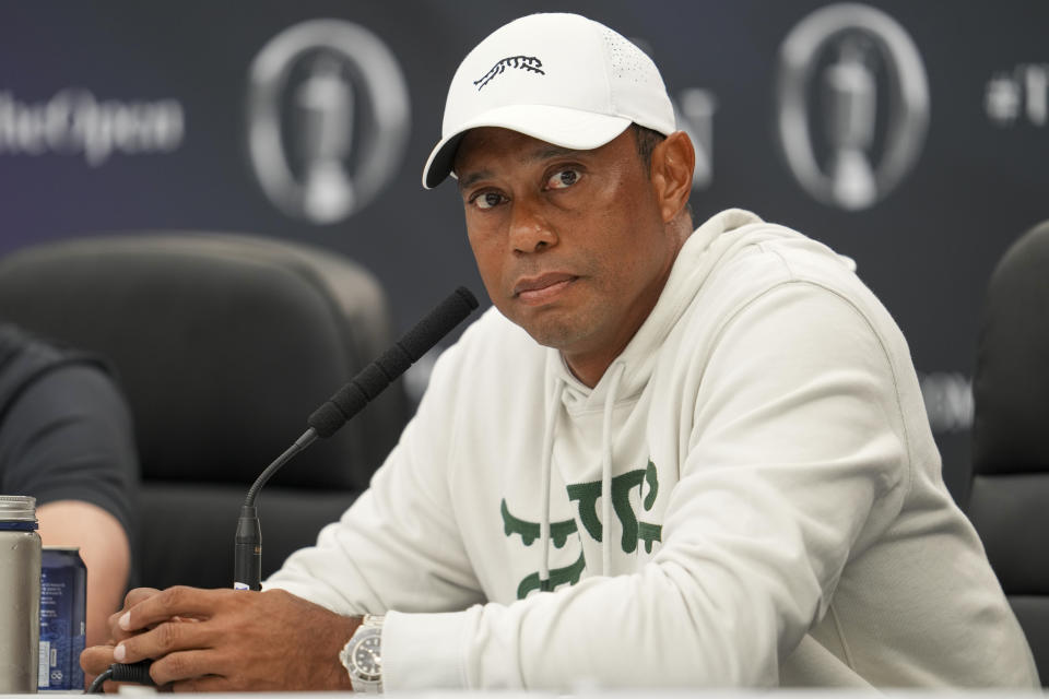 Tiger Woods of the United States answers questions at a press conference ahead of the British Open Golf Championships at Royal Troon golf club in Troon, Scotland, Tuesday, July 16, 2024. (AP Photo/Jon Super)