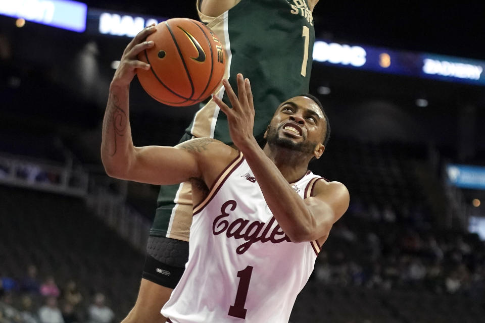Boston College guard Claudell Harris Jr. (1) shoots during the first half of an NCAA college basketball game against Colorado State Wednesday, Nov. 22, 2023, in Kansas City, Mo. (AP Photo/Charlie Riedel)
