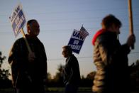 FILE PHOTO: Striking union workers walk the picket line outside the GM Flint Truck Assembly in Flint