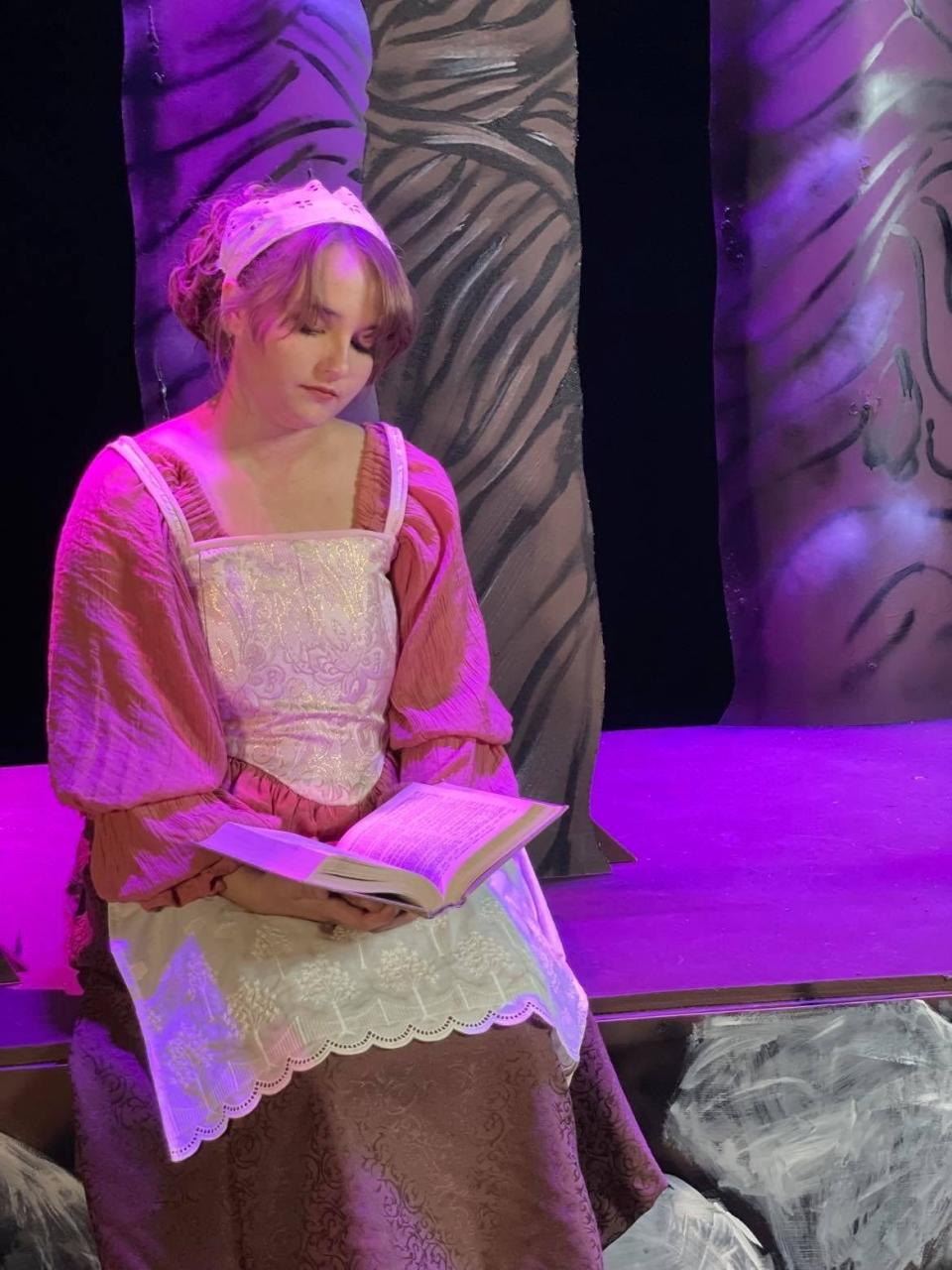 Cinderella (portrayed by Lauren Martin) laments the fact that she is kept from being able to attend Prince Charming's ball by her wicked stepmother and two jealous stepsisters in a scene from Lubbock Community Theatre's production of "Cinderella," scheduled for next weekend as part of the Junior League of Lubbock's annual Holiday Happening at the Lubbock Memorial Civic Center.