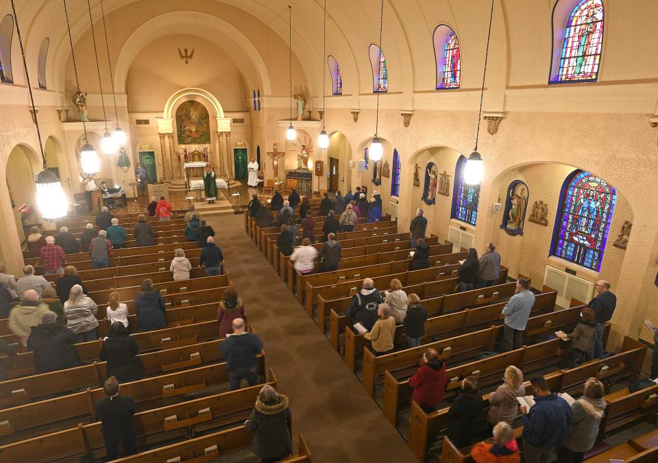 About 75 parishioners attend a Saturday evening Mass on Jan. 15, 2022, at St. Paul Catholic Church, 1617 Walnut St. The Catholic Diocese of Erie says attendance at Masses in Erie County declined by 45% between 2010 and 2022.