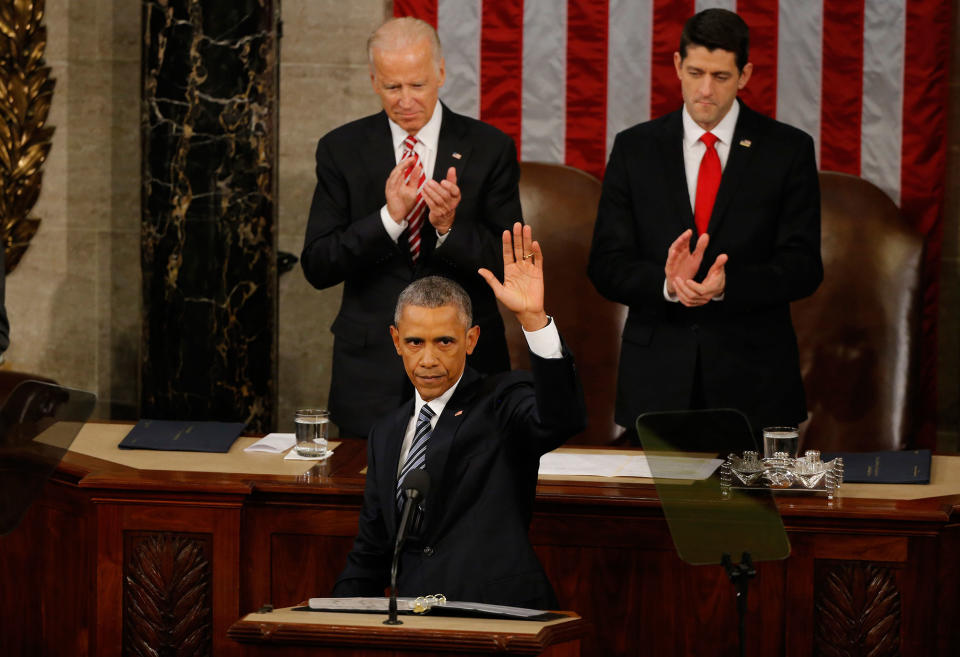 <p>Vice President Joe Biden (L, rear) and Speaker of the House Paul Ryan (R, rear) applaud as U.S. President Barack Obama waves at the conclusion of his State of the Union address to a joint session of Congress in Washington, January 12, 2016. (Carlos Barria/Reuters) </p>