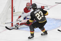 Montreal Canadiens goaltender Carey Price (31) deflects a shot by Vegas Golden Knights defenseman Alec Martinez (23) during the second period in Game 2 of an NHL hockey Stanley Cup semifinal playoff series, Wednesday, June 16, 2021, in Las Vegas. (AP Photo/David Becker)