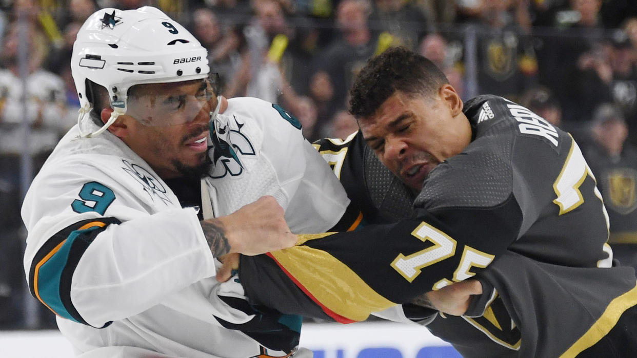 LAS VEGAS, NEVADA - APRIL 14: Evander Kane #9 of the San Jose Sharks and Ryan Reaves #75 of the Vegas Golden Knights fight in the third period of Game Three of the Western Conference First Round during the 2019 NHL Stanley Cup Playoffs at T-Mobile Arena on April 14, 2019 in Las Vegas, Nevada. The Golden Knights defeated the Sharks 6-3 to take a 2-1 lead in the series. (Photo by Ethan Miller/Getty Images) 