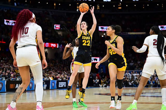 <p>Ben Solomon/NCAA Photos via Getty</p> Caitlin Clark shoots during Sunday's NCAA Women's Basketball Tournament National Championship