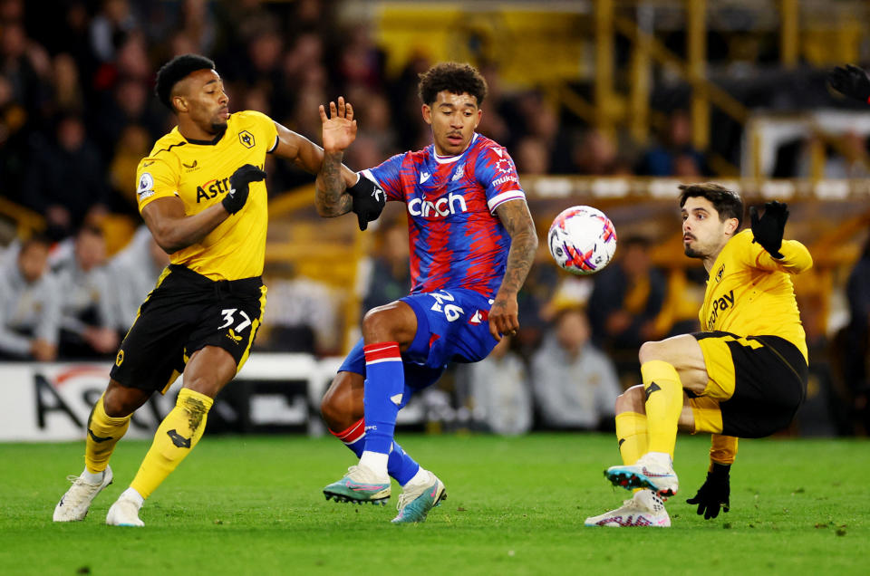 Soccer Football - Premier League - Wolverhampton Wanderers v Crystal Palace - Molineux Stadium, Wolverhampton, Britain - April 25, 2023 Crystal Palace's Chris Richards in action with Wolverhampton Wanderers' Adama Traore and Pedro Neto REUTERS/Carl Recine EDITORIAL USE ONLY. No use with unauthorized audio, video, data, fixture lists, club/league logos or 'live' services. Online in-match use limited to 75 images, no video emulation. No use in betting, games or single club /league/player publications.  Please contact your account representative for further details.