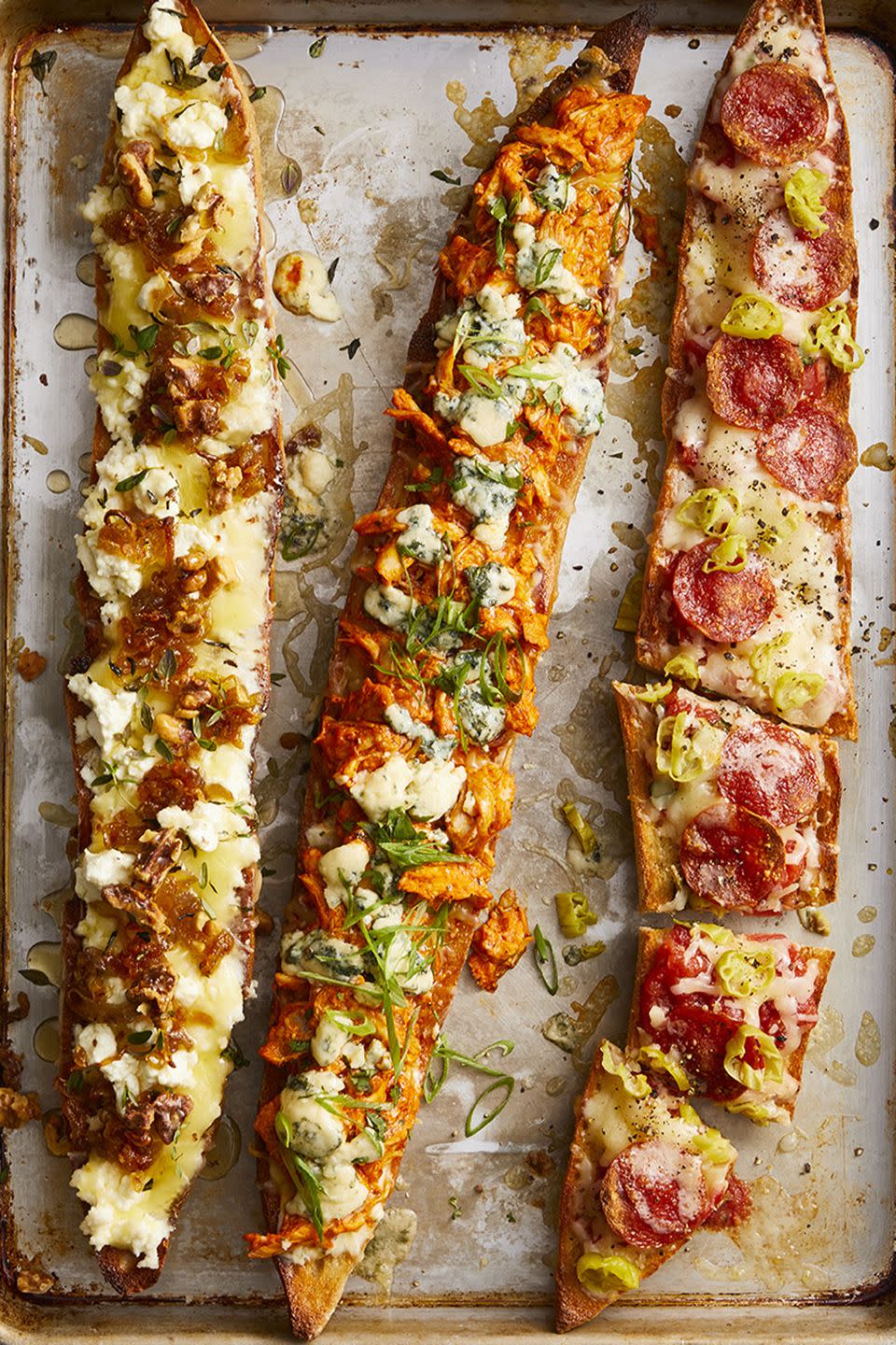 <p>Pizza counts as a snack, right? Well, it depends how you slice it.</p><p>Get the <a href="https://www.goodhousekeeping.com/food-recipes/easy/a47670/baguette-pizza-recipe/" rel="nofollow noopener" target="_blank" data-ylk="slk:Baguette Pizzas recipe;elm:context_link;itc:0;sec:content-canvas" class="link "><strong>Baguette Pizzas recipe</strong></a>.</p>