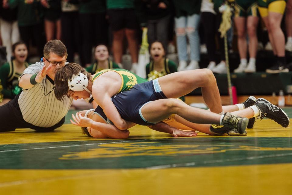 The Great Falls High and CMR wrestling teams squared off in a dual Tuesday at CMR Fieldhouse. The Bison took a close victory in the rivalry 40-33.