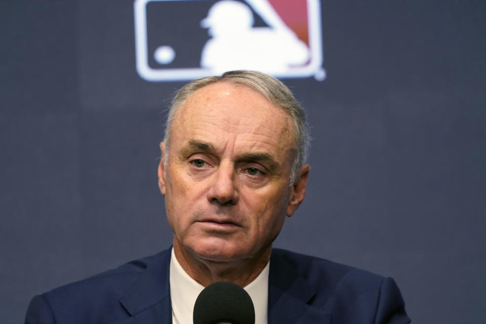 Major League Baseball commissioner Rob Manfred speaks during a news conference in Arlington, Texas, Thursday, Dec. 2, 2021. Owners locked out players at 12:01 a.m. Thursday following the expiration of the sport's five-year collective bargaining agreement. (AP Photo/LM Otero)