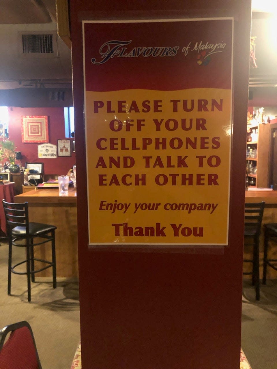 A sign at Flavours restaurant in Pittsfield, Massachusetts implores customers to put away their phones.