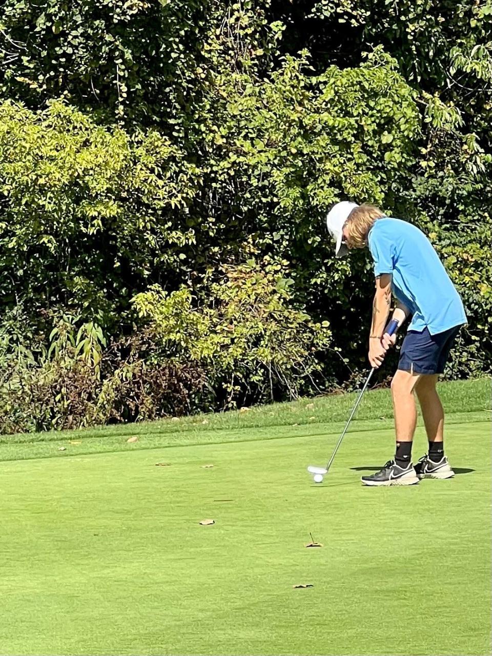 River Valley's Thomas Kaufman putts the ball during the Mid Ohio Athletic Conference Boys Golf Tournament last week at the Country Club of Bucyrus.