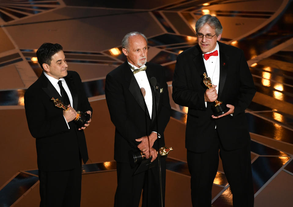 Sound mixers Gary A. Rizzo, Gregg Landaker and Mark Weingarten accept Best Sound Mixing for 'Dunkirk' onstage during the 90th Annual Academy Awards at the Dolby Theatre at Hollywood & Highland Center on March 4, 2018 in Hollywood.