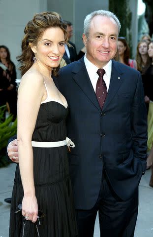 <p>Kevin Winter/Getty</p> Tina Fey and Lorne Michaels in 2004