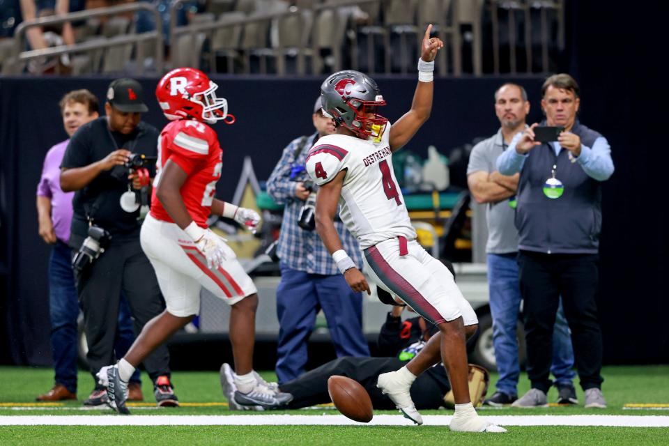 Destrehan quarterback Jai Eugene (4) scores what would be the game-winning touchdown in the fourth quarter as the Destrehan Wildcats face the Ruston Bearcats for the  Division I non-select Louisiana High School State Championship at the Superdome on Friday, December 9, 2022.  (Photo by Michael DeMocker)
