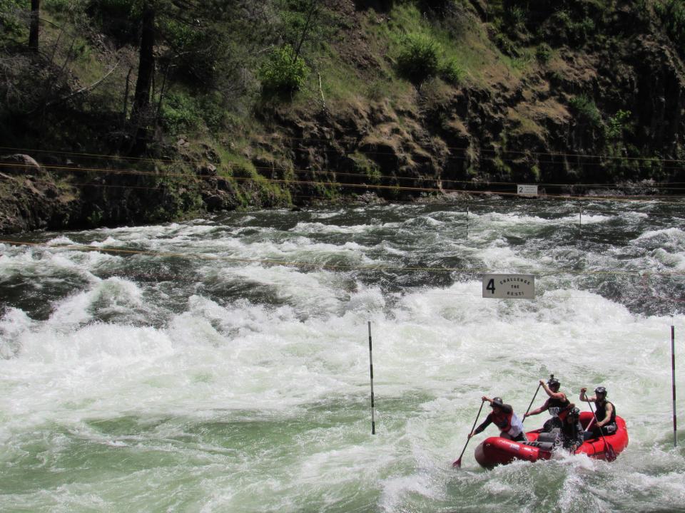 A team of four passes through the fourth gate at Carter Falls on Saturday, May 20, 2023.