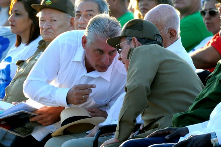 First Vice President Miguel Diaz-Canel, left, is seen as the likely successor to President Raul Castro, right