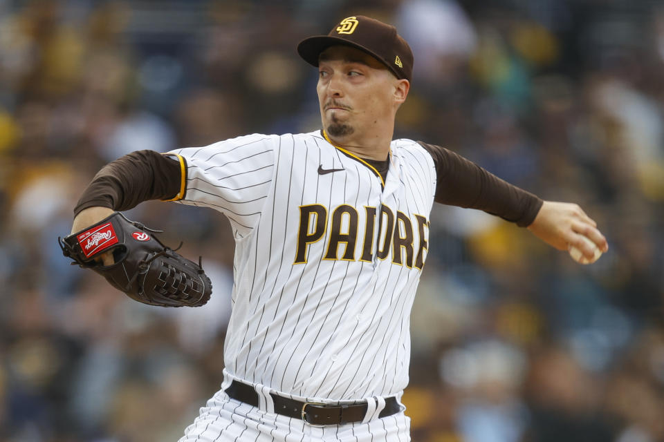 San Diego Padres starting pitcher Blake Snell delivers against the Milwaukee Brewers during the first inning of a baseball game Tuesday, May 24, 2022, in San Diego. (AP Photo/Mike McGinnis)