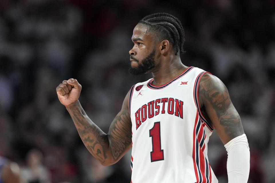 Houston's Jamal Shead celebrates during a game against Kansas on March 9.