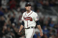 Atlanta Braves pitcher Max Fried walks to the dugout during the fourth inning in Game 1 of baseball's National League Championship Series against the Los Angeles Dodgers Saturday, Oct. 16, 2021, in Atlanta. (AP Photo/Ashley Landis)