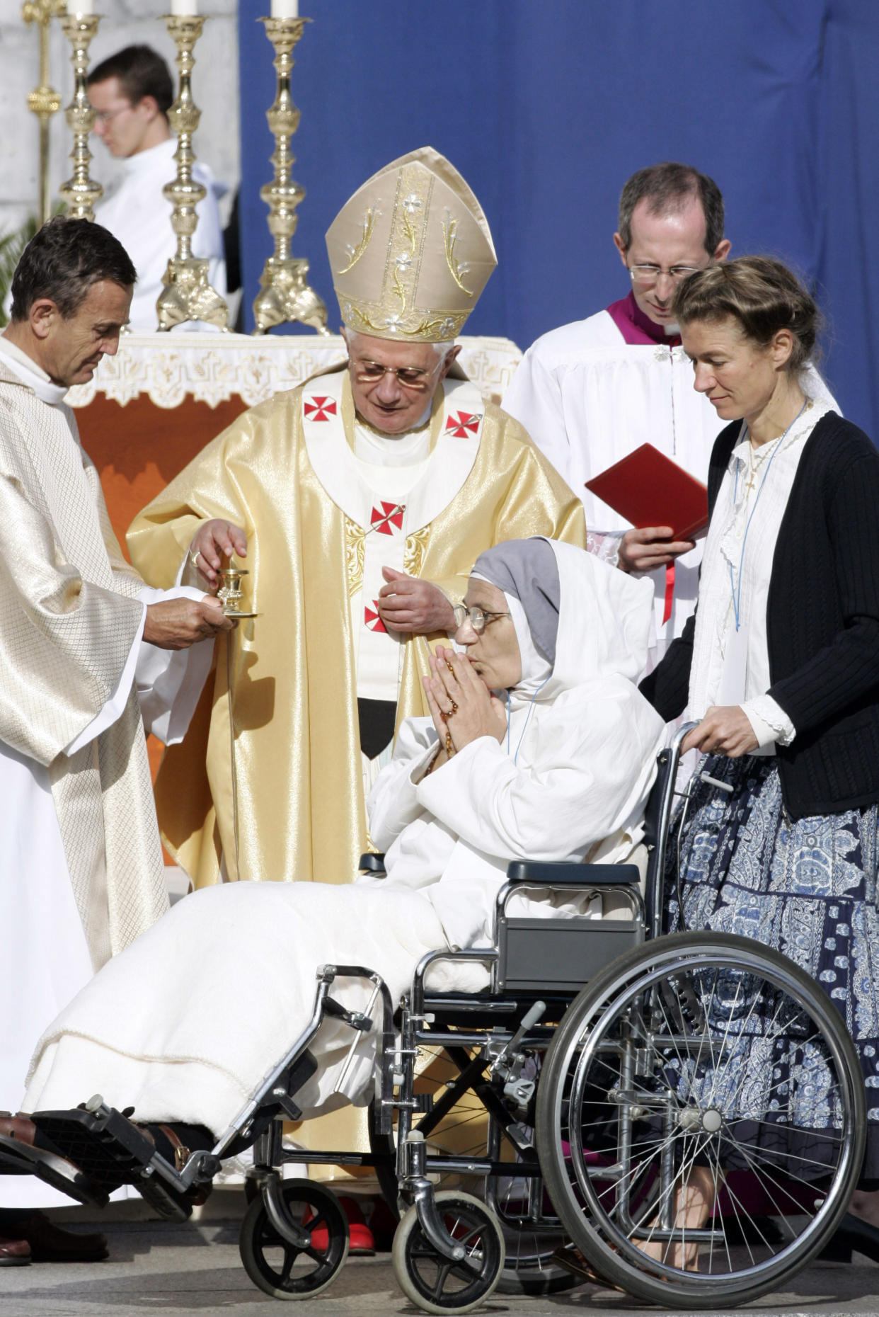 FILE - Pope Benedict XVI celebrates a special mass for the sick in front of the Basilica of the Rosary in Lourdes, France, on Sept. 15, 2008. Pope Emeritus Benedict XVI, the German theologian who will be remembered as the first pope in 600 years to resign, has died, the Vatican announced Saturday. He was 95. (AP Photo/Francois Mori, File)