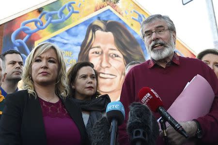 Sinn Fein President Gerry Adam sand Sinn Fein leader Michelle O'Neill speak to media outside the Sinn Fein offices on Falls Road in Belfast, Northern Ireland March 4, 2017. REUTERS/Clodagh Kilcoyne