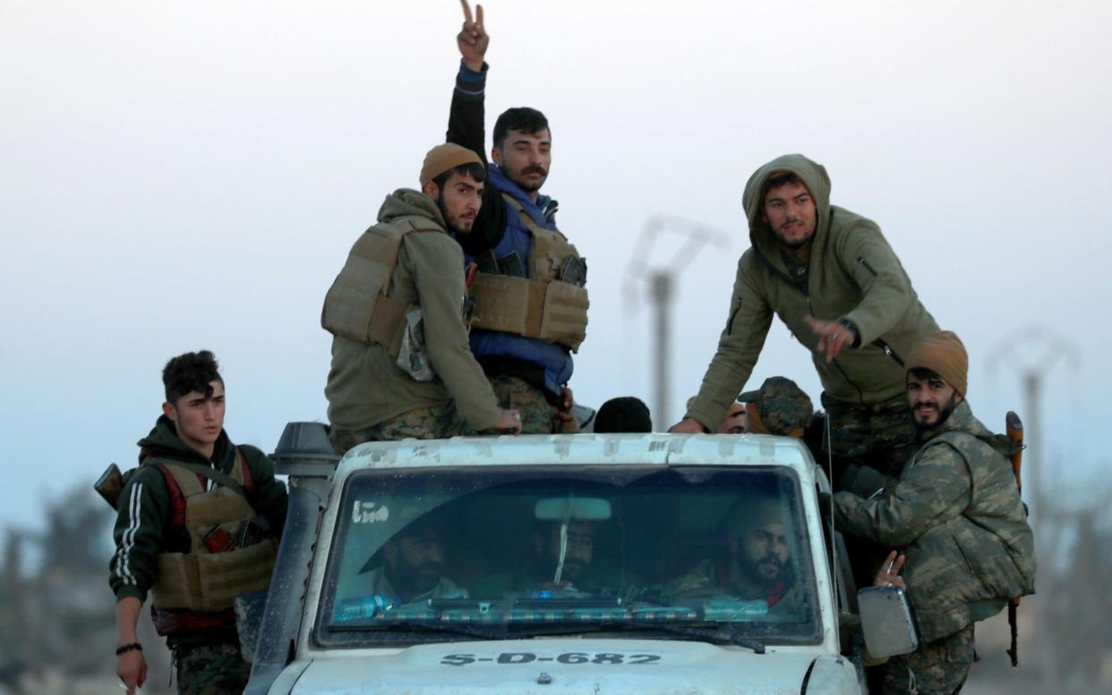 Members of the Syrian Democratic Forces (SDF) in Hajin, in the Deir Ezzor province, eastern Syria - AFP