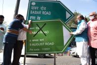 NEW DELHI, INDIA - AUGUST 4: BJP leader Vijay Goel, along with a group of supporters, pasted a poster reading 5 August Marg on a sign at Babar Road, at Bengali Market on August 4, 2020 in New Delhi, India. Goel has demanded that Babar Road, named after the Mughal ruler, should be renamed either to 5 August Marg or be named after an eminent personality. (Photo by Arvind Yadav/Hindustan Times via Getty Images)